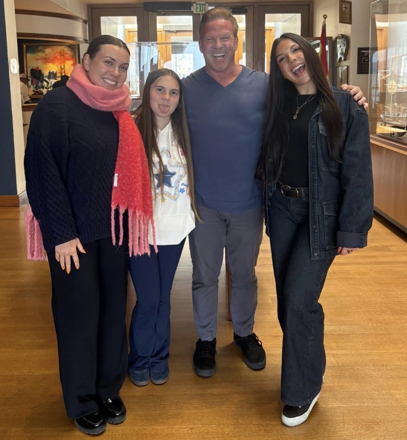 Coach Bill with his three daughters